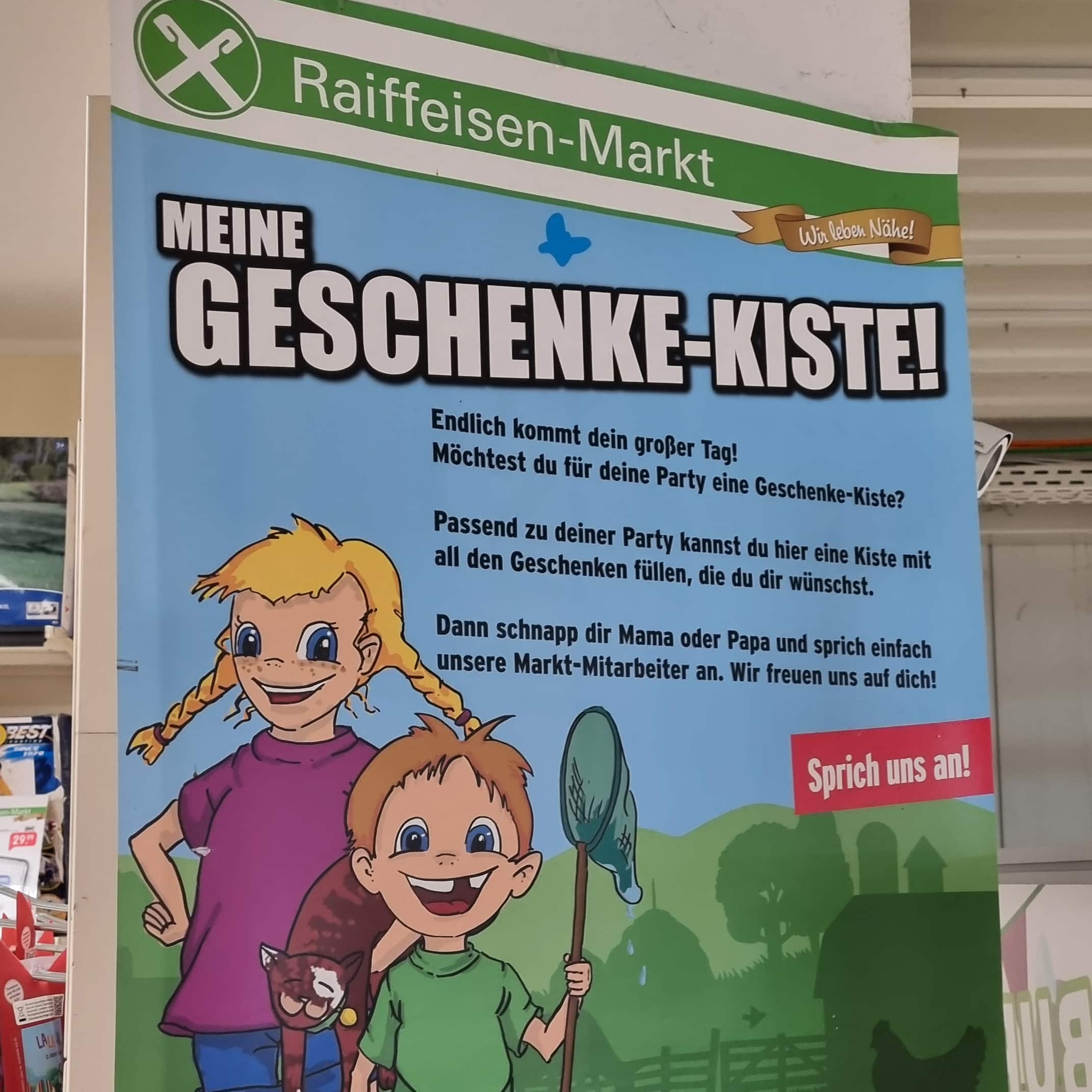 Cartel de la caja regalo Raiffeisen Market en una sucursal